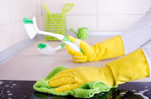 Staff training session for safe cleaning methods and equipment handling
