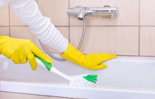 Cleaner completing a final follow-up after resolving a complaint