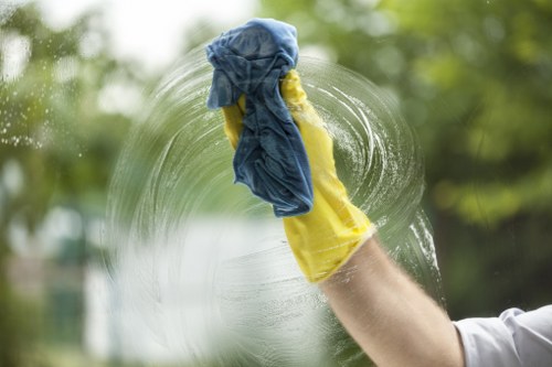 Technician carrying out sofa upholstery cleaning in Tufnellpark